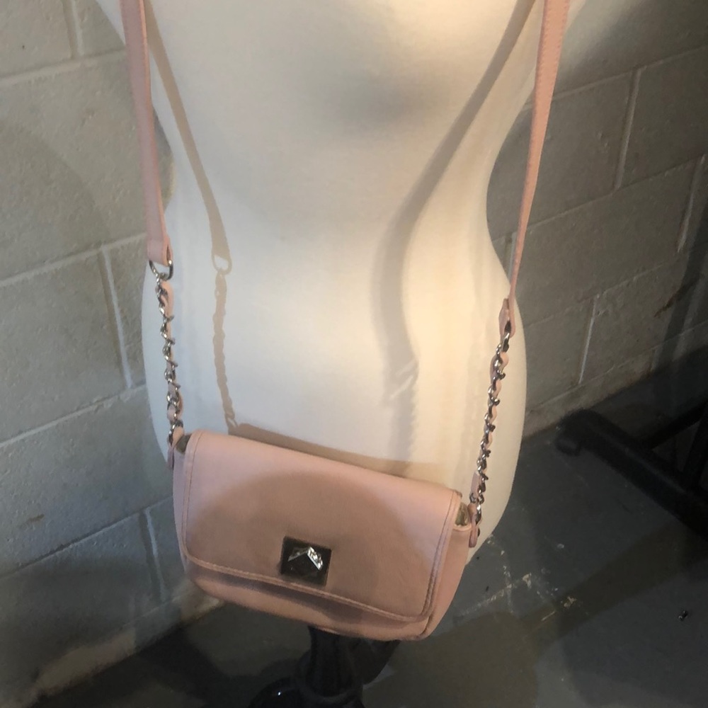 Women’s pink leather crossbody bag